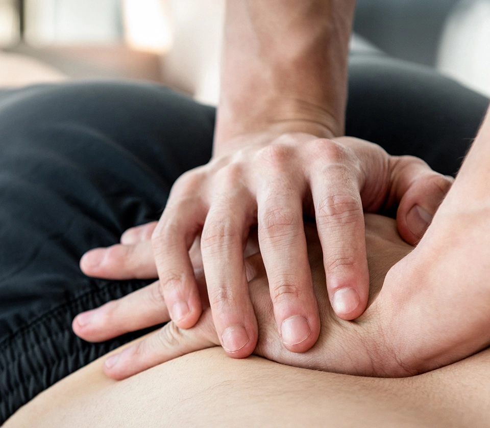 chiropractor-adjusting-lower-back