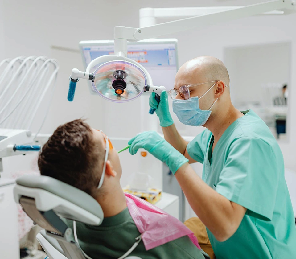 Dentist-cleaning-patient-teeth