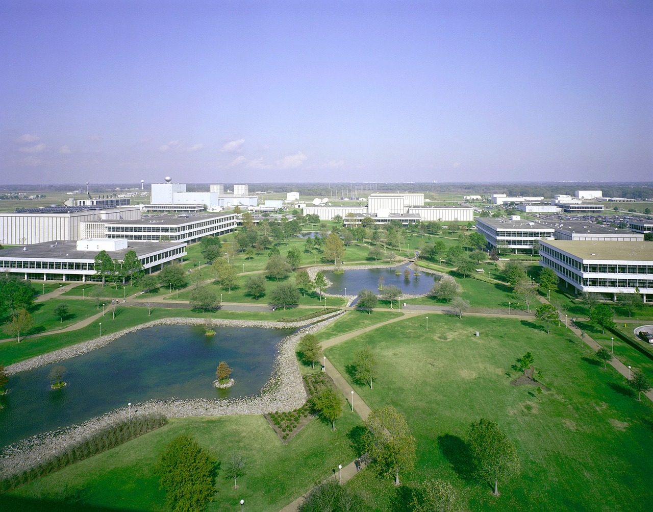 Office campus among trees and lakes